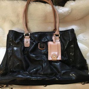 GUESS luggage. Tote, diaper bag, large purse etc. Gorgeous and classic.